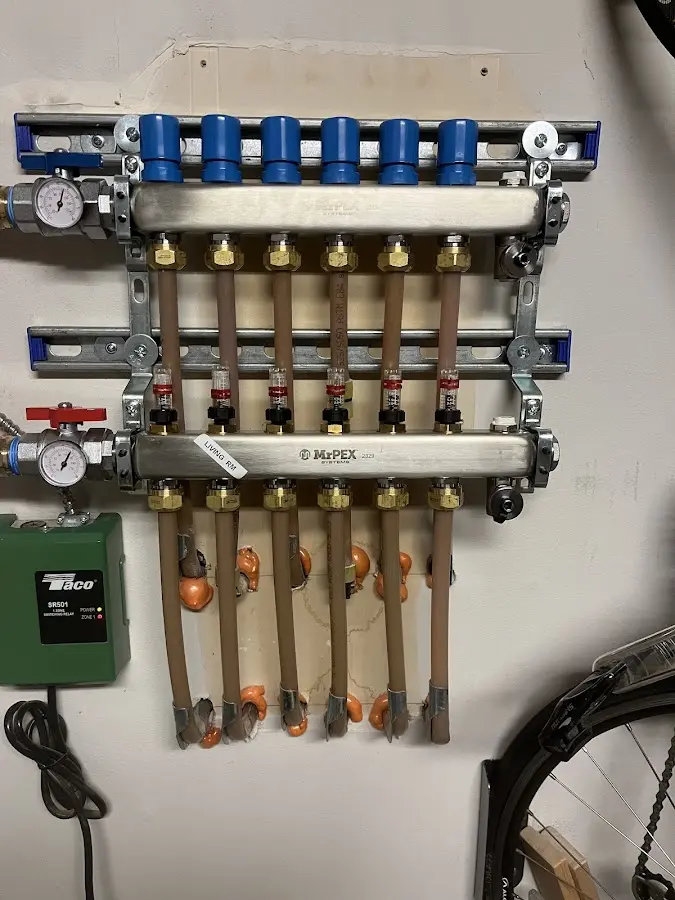 Plumber performing Gas Leak Detection at a residential property in Sandy